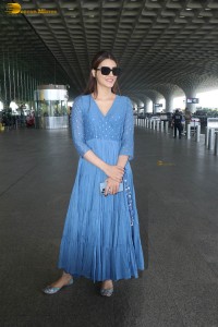 actress kriti sanon seen in a blue dress at airport