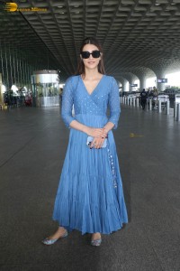actress kriti sanon seen in a blue dress at airport