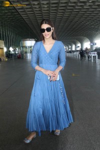actress kriti sanon seen in a blue dress at airport