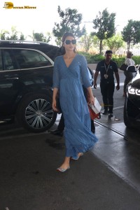 actress kriti sanon seen in a blue dress at airport