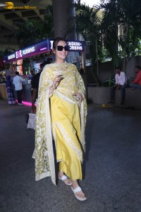 actress kriti sanon seen in a yellow salwar dress in mumbai