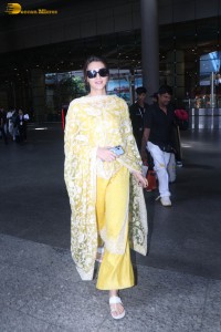 actress kriti sanon seen in a yellow salwar dress in mumbai