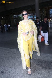 actress kriti sanon seen in a yellow salwar dress in mumbai