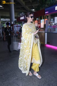 actress kriti sanon seen in a yellow salwar dress in mumbai