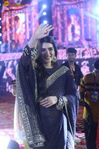 indian actress kriti sanon in a shiny black saree at a movie event