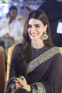 indian actress kriti sanon in a shiny black saree at a movie event