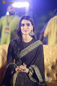 indian actress kriti sanon in a shiny black saree at a movie event