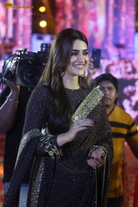 indian actress kriti sanon in a shiny black saree at a movie event
