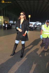 kriti sanon stylish looks in a overcoat and jeans