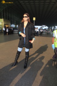 kriti sanon stylish looks in a overcoat and jeans