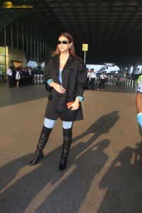 kriti sanon stylish looks in a overcoat and jeans