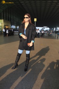 kriti sanon stylish looks in a overcoat and jeans