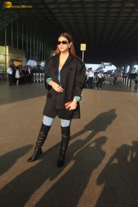 kriti sanon stylish looks in a overcoat and jeans