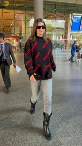 actress Kriti Sanon making a fashion statement at mumbai airport with a stylish look