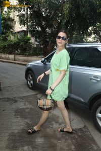 bollywood actress kriti sanon in green t-shirt and shorts