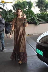 actress Kriti Sanon gorgeous in a brown dress at mumbai airport
