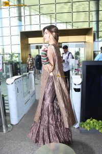 actress Kriti Sanon gorgeous in a brown dress at mumbai airport