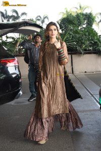 actress Kriti Sanon gorgeous in a brown dress at mumbai airport