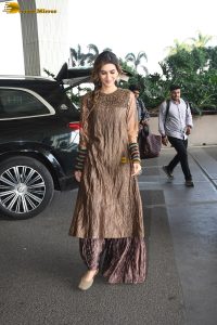 actress Kriti Sanon gorgeous in a brown dress at mumbai airport