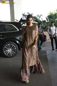 actress Kriti Sanon gorgeous in a brown dress at mumbai airport