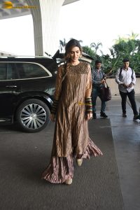 actress Kriti Sanon gorgeous in a brown dress at mumbai airport