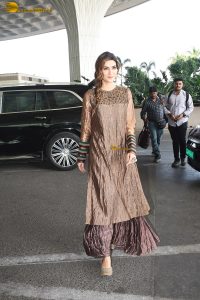 actress Kriti Sanon gorgeous in a brown dress at mumbai airport