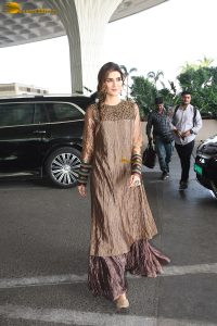 actress Kriti Sanon gorgeous in a brown dress at mumbai airport