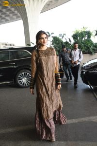 actress Kriti Sanon gorgeous in a brown dress at mumbai airport