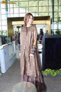 actress Kriti Sanon gorgeous in a brown dress at mumbai airport