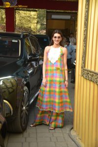bollywood actress kriti sanon in a yellow dress