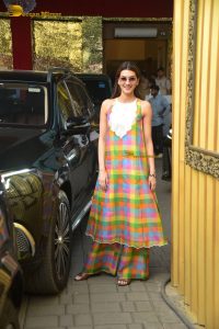 bollywood actress kriti sanon in a yellow dress