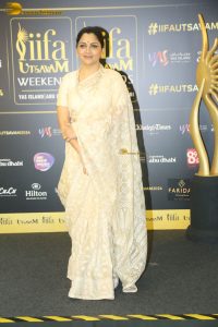 Indian actress Kushboo lovely in a yellow saree