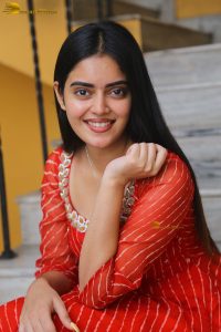 actress kushitha kallapu cute photo shoot in a red salwar