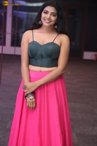 actress lahari stylish looks in a grey top and pink skirt