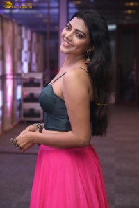 actress lahari stylish looks in a grey top and pink skirt