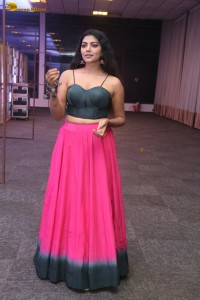 actress lahari stylish looks in a grey top and pink skirt
