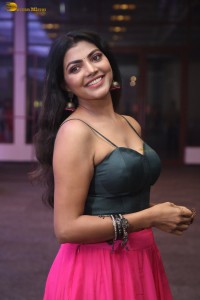 actress lahari stylish looks in a grey top and pink skirt