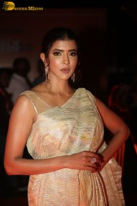 mohan babu daughter and actress lakshmi manchu in a gold color saree