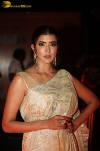 mohan babu daughter and actress lakshmi manchu in a gold color saree