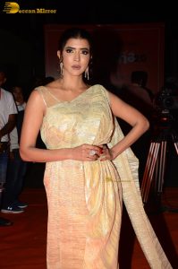 mohan babu daughter and actress lakshmi manchu in a gold color saree