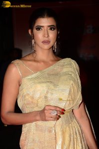 mohan babu daughter and actress lakshmi manchu in a gold color saree