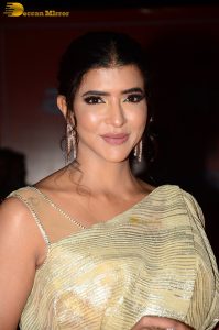 mohan babu daughter and actress lakshmi manchu in a gold color saree