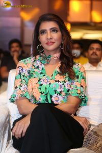 mohan babu daughter and actress Lakshmi Manchu in a green shirt at an event