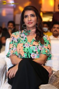 mohan babu daughter and actress Lakshmi Manchu in a green shirt at an event