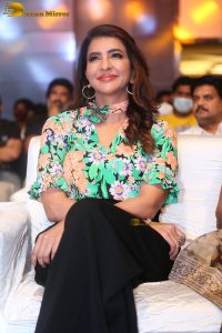 mohan babu daughter and actress Lakshmi Manchu in a green shirt at an event