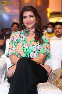 mohan babu daughter and actress Lakshmi Manchu in a green shirt at an event