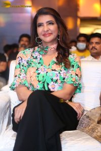 mohan babu daughter and actress Lakshmi Manchu in a green shirt at an event