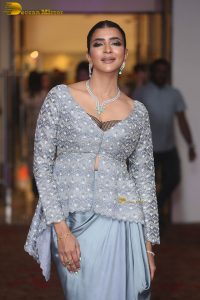 actress and producer Lakshmi Manchu spotted in a silver blue dress at an event