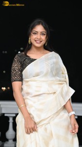 Actress lavannya sahukara in a white saree