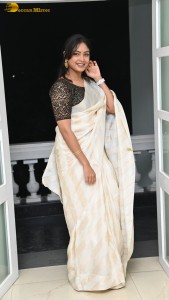 Actress lavannya sahukara in a white saree